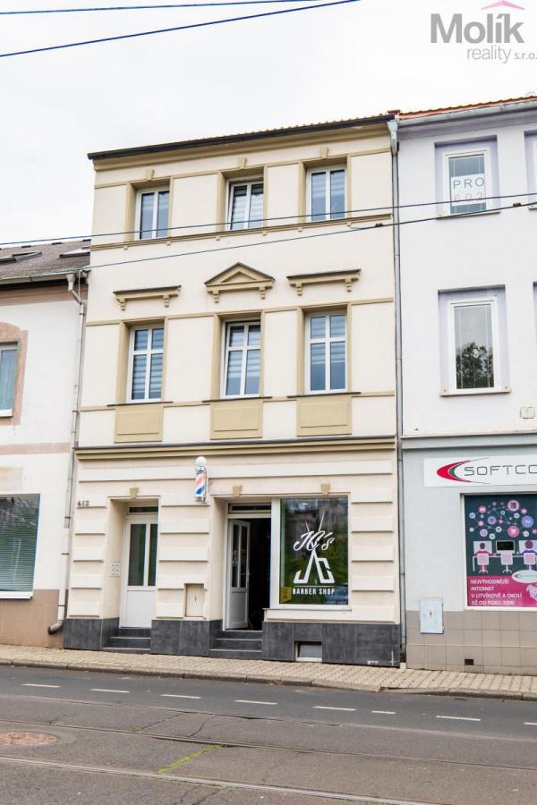 Rodinný dům se 2 bytovými jednotkami a komerčním prostorem, obec Litvínov