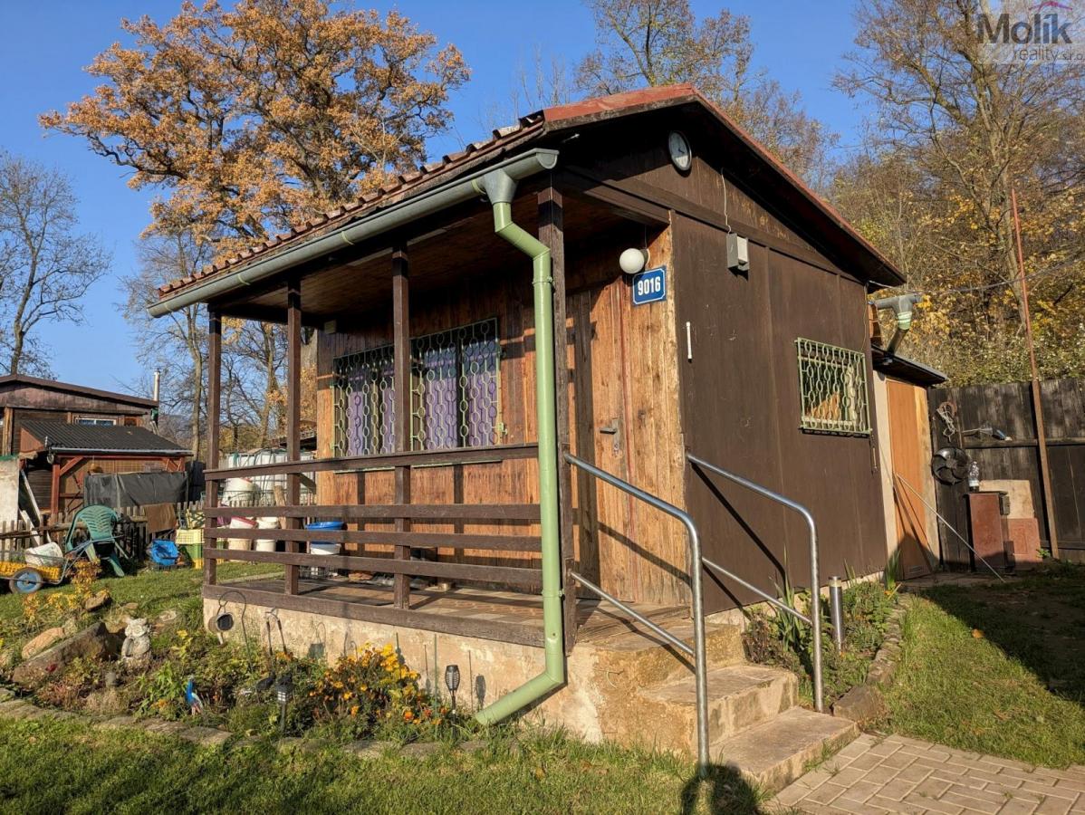 K prodeji chata se zahradou (483 m2)  v obci Chlumec, katastrální území Chlumec u Chabařovic