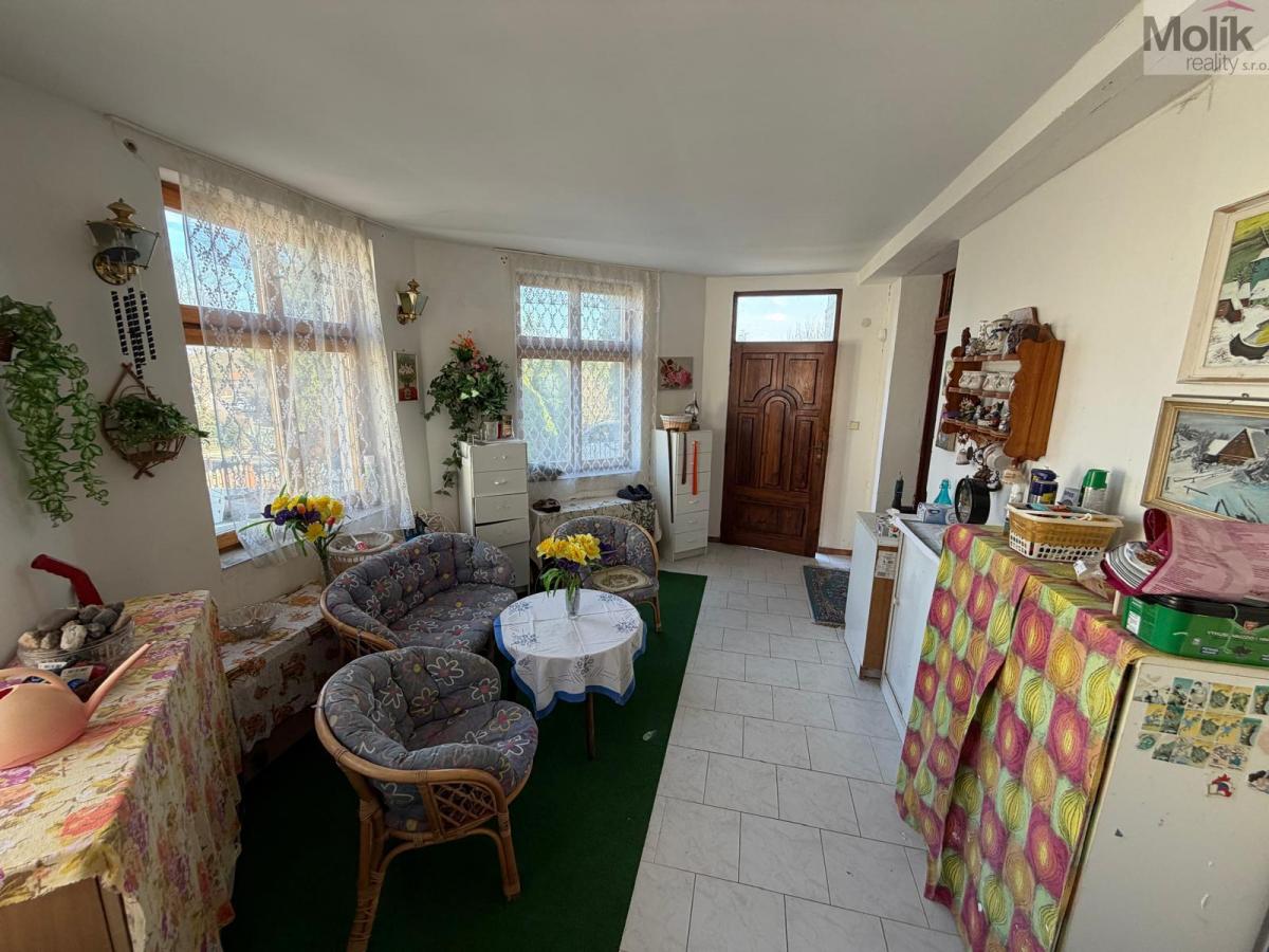 Rodinný dům, Měcholupy