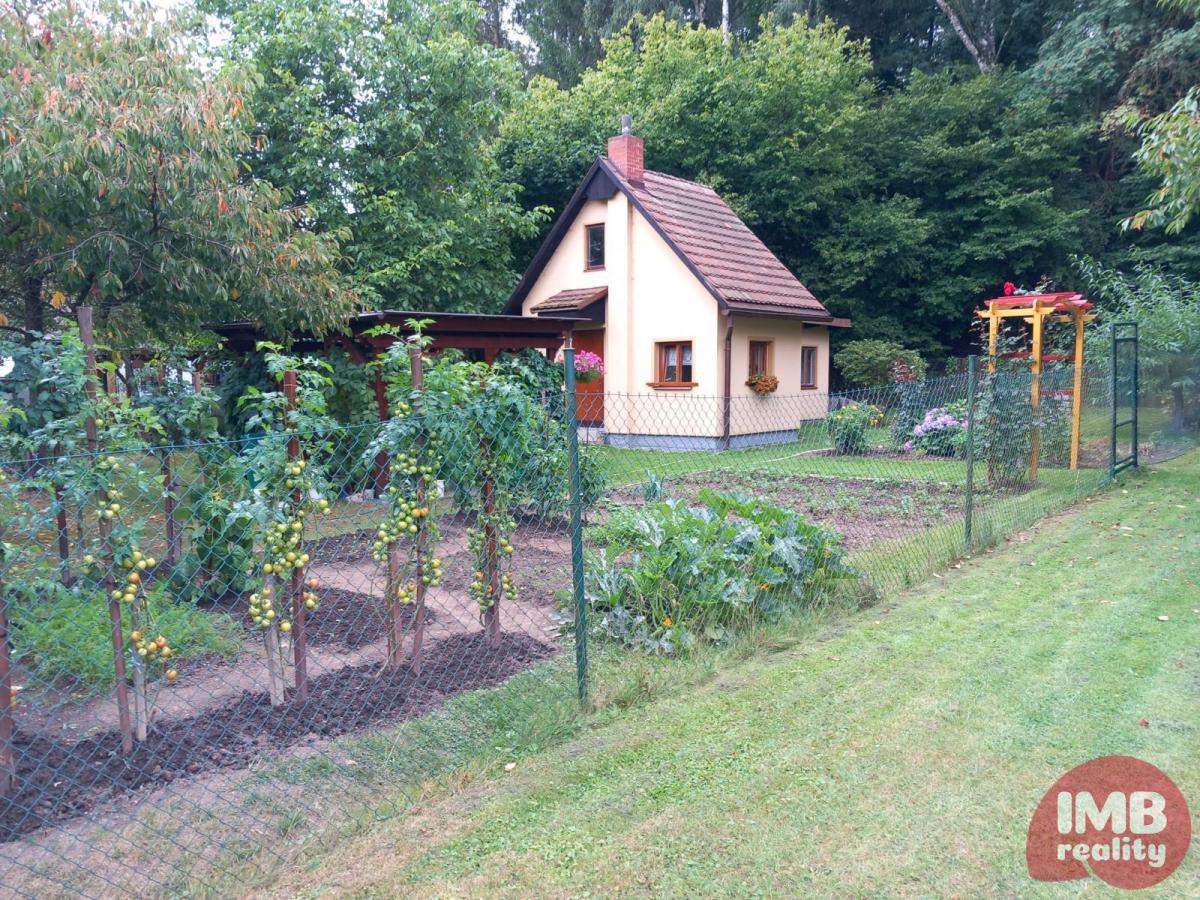 Prodej zahrady s chatou v Chodově