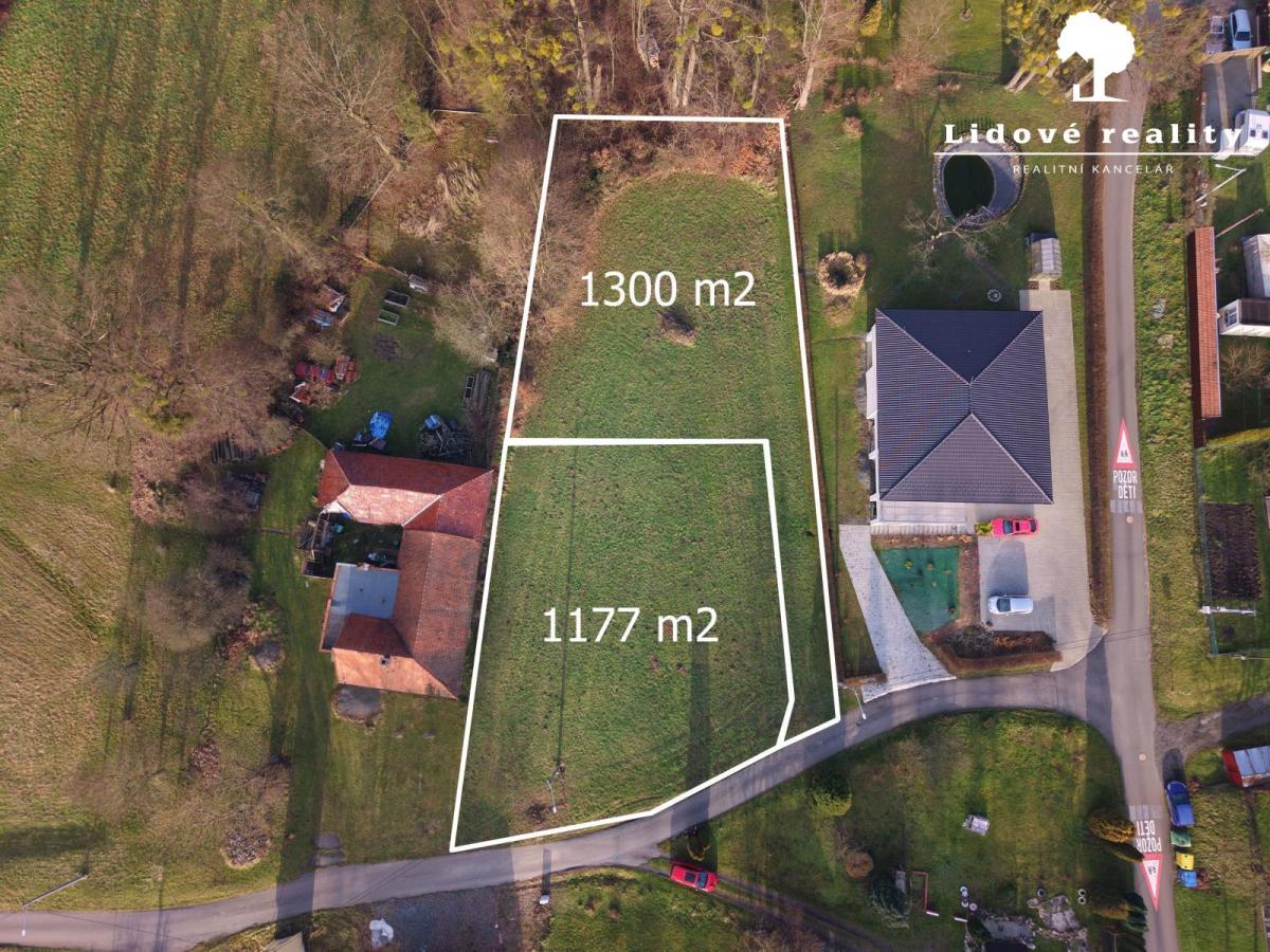 Prodej stavebního pozemku 1300 m2  Jeseník nad Odrou - Polouvsí