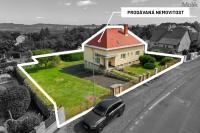 Rodinný dům 4+2+B (260 m2) se zahradou a dvěma garážemi v obci Hrob, ulice Verneřice 61.