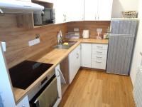Prodej bytu 3+kk 68 m² s lodžií - Kuchyň 2.JPG