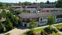 Prodej polyfunkčního domu s byty, prodejnou a zahradou na promenádě Lipno nad Vltavou