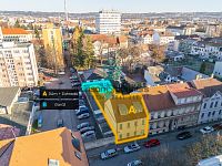 Prodej cihlového činžovního  domu s garáží, zahradou a skvělou polohou v Komenského ulici.