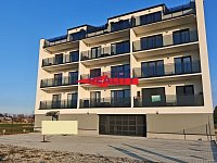 Pronájem novostavby s prostornou terasou a parkovací místo - dům