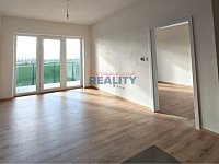 Pronájem novostavby s prostornou terasou a parkovací místo - obývák