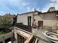 Prodej rodinného domu s dvěma bytovými jednotkami, s garáží a zahrádkou, ul. Fügnerova, Bílina,315m2 - stažený soubor (25).jpg