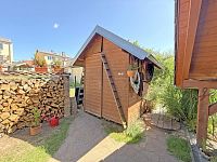 Rodinný dům 5 + kk s fotovoltaikou a zahradou 597 m², lokalita Homole u Českých Budějovic - dřevník.jpg