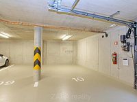 Pronájem parkovacího stání 21 m2 v novostavbě, Praha 10 - Horní Měcholupy