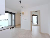 Pronájem bytu 2+kk/L/G 43 m2 v novostavbě, Praha 8 Bohnice, nezařízeno - pohled od kuchyn.JPG