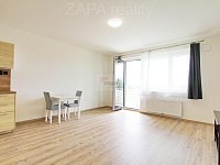 pronájem bytu 2+kk/B 57,6 m2 novostavba 2.patro s výtahem Praha 9 Kbely část. zař. - obvac pokoj balkon logo.JPG
