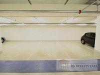 Kryté garážové stání + sklep v novostavbě Garden Towers