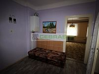 Prodej řadového rodinného domu ve vynikající lokalitě Českých Budějovic - Chodba se závěsným plynovým kotlem  v 1.patře ( zvýšené přízemí )