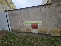 Stavební pozemek o výměře 415 m² ve středu Kamenného Újezdu s možností koupě vedlejší nemovitosti - Přípojka plynu.