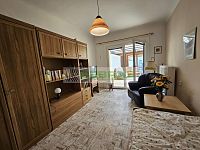 Rodinný dům s velkým potenciálem a navazujícím stavebním pozemkem v srdci Kamenného Újezdu! - Další pokoj s navazující zimní zahradou