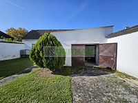 Rodinný dům s garáží, hospodářskými budovami a velkou navazující zahradou v srdci Kamenného Újezdu! - Prostorná garáž