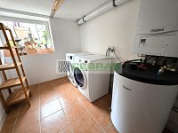 Městský dům v žádané lokalitě širšího centra Č. Budějovic 7 se zahradou, terasou a krytým parkováním - Sklepní podlaží  - část prádelna