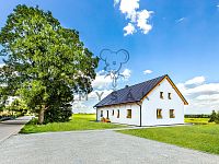 Zařízená garsoniéra s parkovacím místem v novostavbě domu v Drahotěšicích