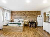 Zařízená garsoniéra s parkovacím místem v novostavbě domu v Drahotěšicích - 260310_Fotoface_01.jpg