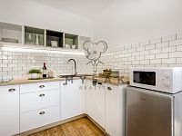 Zařízená garsoniéra s parkovacím místem v novostavbě domu v Drahotěšicích - Fotoface_56.jpg