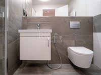 Prodej luxusního bytu 1+KK v novostavbě v Kobylisích, ul. Pakoměřická. - Fotka 11