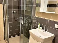 Prodej bytu 1+kk, 30,7 m2 s balkonem 3 m2 a sklepem 4m2 v novostavbě, P-10, ul. Horolezecká - Fotka 11