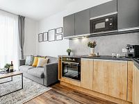 Prodej apartmánového bytu Lipno nad Vltavou - Fotoface_39.jpg