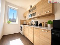 Moderní a prostorný byt 2+1 s parkovacím místem a zahradou