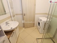 Slunná bytová jednotka 1+kk ve třetím patře novostavby z roku 2019 ve Stodůlkách - 8