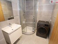 Moderní a designová bytová jednotka 1+kk v prvním patře novostavby ve Vysočanech - 12