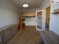 Pěkný útulný byt 2+kk ve druhém patře cihlového domu se zahradou