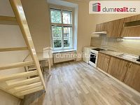 Pronájem bytu 1+kk 22m2 po rekonstrukci P5 Smíchov zařízený cihla