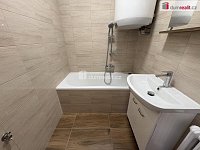 pronájem revitalizovaného bytu s balkónem, garáží a parkovacím místem před domem Milín - 2