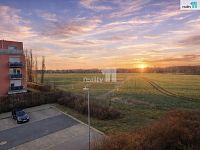 Byt 1kk s balkonem a parkovacím stáním, novostavba domu v Hostivicích ul. Ječná - výhled z balkonu