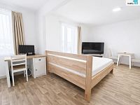 Byt 1kk, 37 m2 s balkonem a parkovacím stáním v Nehvizdech - nyní bez nábytku