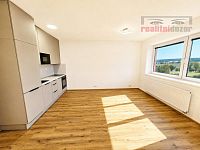 Nájem bytu 1+kk s balkonem, šatnou a sklepem Brno – Žebětín,  výstavba Kamechy II., novostavba