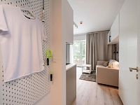 Ihned k nastěhování. Investiční 2+kk u Prahy 6. - Tuchomněřice Vzorový byt Chodba.jpg