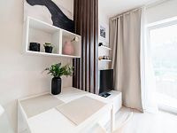 Ihned k nastěhování. Investiční 2+kk u Prahy 6. - Tuchomněřice Vzorový byt  Jídelna.jpg