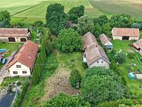 Prodej pozemku v obci Kostěnice - dji_fly_20250609_104812_0327_1749460081573_photo.jpeg