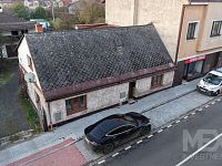Rodinný dům s investičním potenciálem v centru Červeného Kostelce