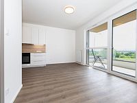 Pronájem novostavby 2 + kk s balkonem, parkovacím stáním a sklepem - obývací pokoj.jpeg
