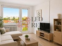 Slunný byt 2+kk po kvalitní rekonstrukci s panoramatickým výhledem na Prahu v Kobylisích