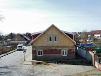 Dům s projektem na 2 byty + nová střecha | skvělá investice | Postoloprty - dji_fly_20260328_140300_424_1774704737984_photo_optimized.jpg