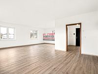 Prodej novostavby RD 4+kk v Podolí I. - obývací pokoj s kuchyňským koutem