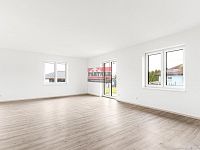 Prodej novostavby RD 4+kk v Podolí I. - obývací pokoj s kuchyňským koutem