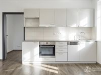 Dům se dvěma bytovými prostory, komerčně využitelným přízemím a užitným suterénem v Krajkové - byt 3+1